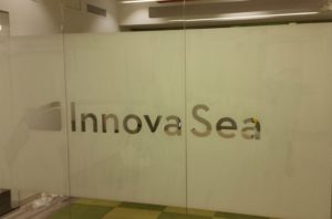 Example of WFD project with cut lettering and corporate logos applied to the glass surface: Innova Sea