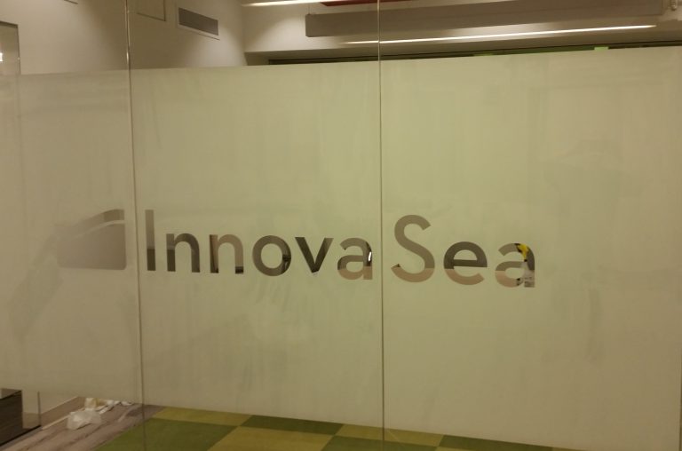 Example of WFD project with cut lettering and corporate logos applied to the glass surface: Innova Sea