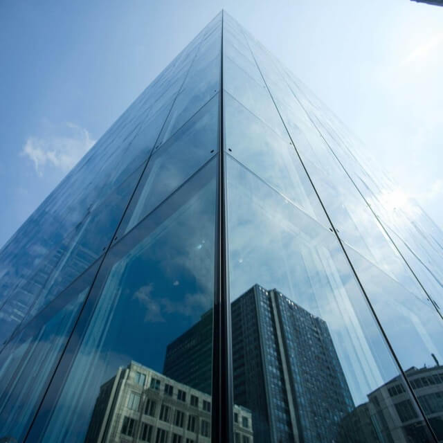 bulletproof glass on building Medium Glass on a building with protective window film.