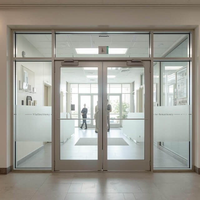 Sliding glass doors going into a hospital or wellness center