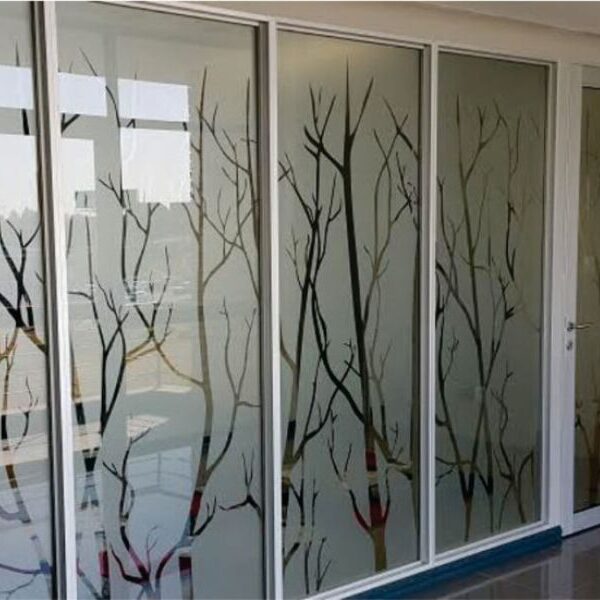 Decorative frosted window film on a storefront